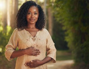 Black_woman_mid_forties_smiling_wellbeing